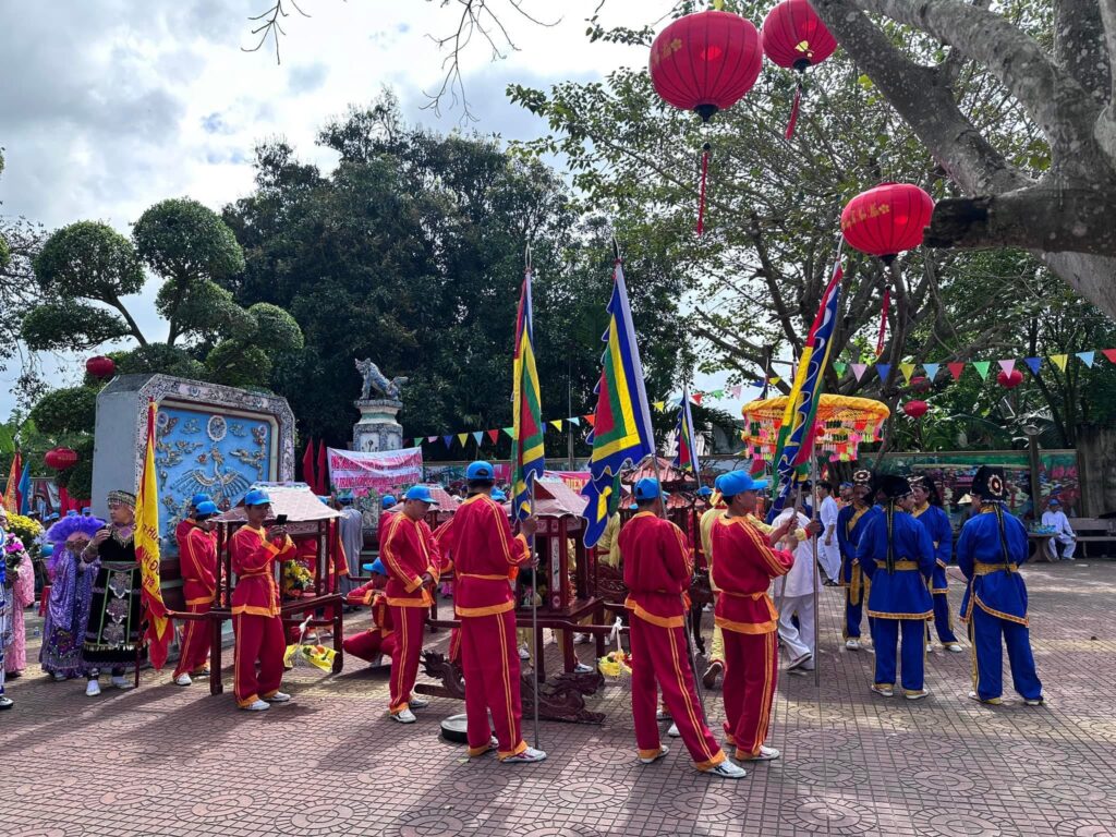 Ceremonial Flag Bearers at Nuoc Man Temple