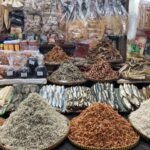 Dried seafood and local specialties displayed at a market in Quy Nhon